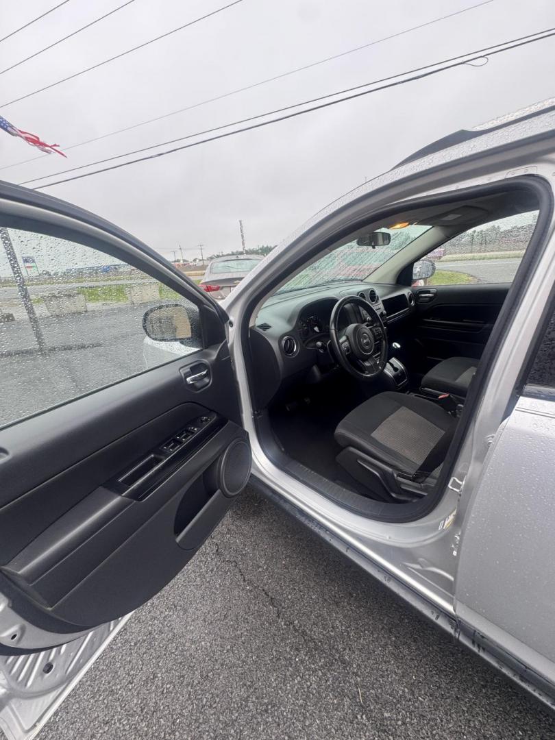 2011 Silver Jeep Compass (1J4NT1FB9BD) with an 4-Cyl, 2.0 Liter engine, CVT Automatic w/OD transmission, located at 8008 Warden Rd, Sherwood, AR, 72120, (501) 801-6100, 34.830078, -92.186684 - Photo#2