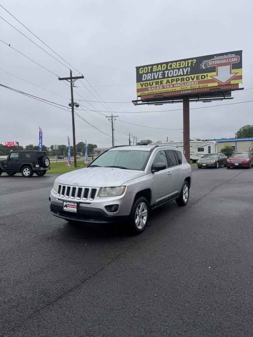 2011 Silver Jeep Compass (1J4NT1FB9BD) with an 4-Cyl, 2.0 Liter engine, CVT Automatic w/OD transmission, located at 8008 Warden Rd, Sherwood, AR, 72120, (501) 801-6100, 34.830078, -92.186684 - Photo#1