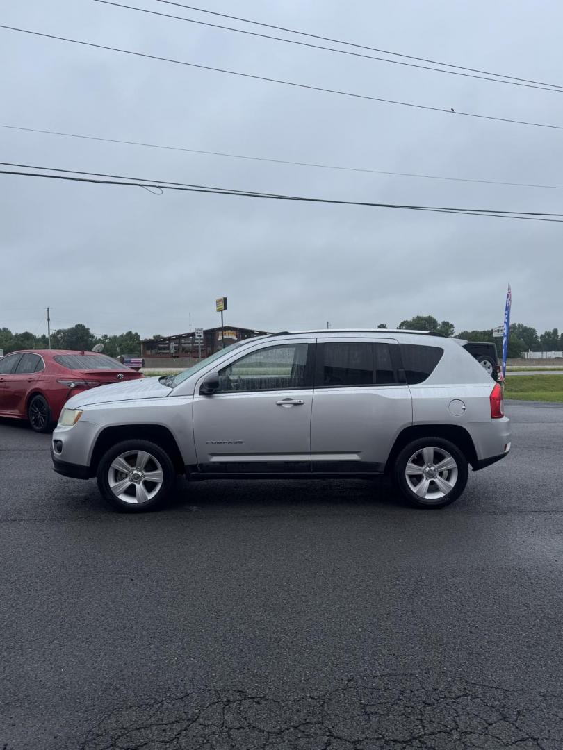 2011 Silver Jeep Compass (1J4NT1FB9BD) with an 4-Cyl, 2.0 Liter engine, CVT Automatic w/OD transmission, located at 8008 Warden Rd, Sherwood, AR, 72120, (501) 801-6100, 34.830078, -92.186684 - Photo#4