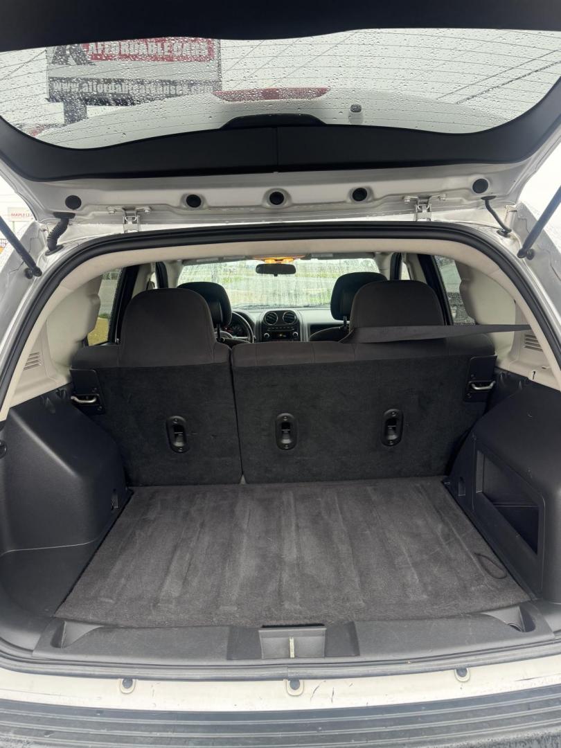 2011 Silver Jeep Compass (1J4NT1FB9BD) with an 4-Cyl, 2.0 Liter engine, CVT Automatic w/OD transmission, located at 8008 Warden Rd, Sherwood, AR, 72120, (501) 801-6100, 34.830078, -92.186684 - Photo#8