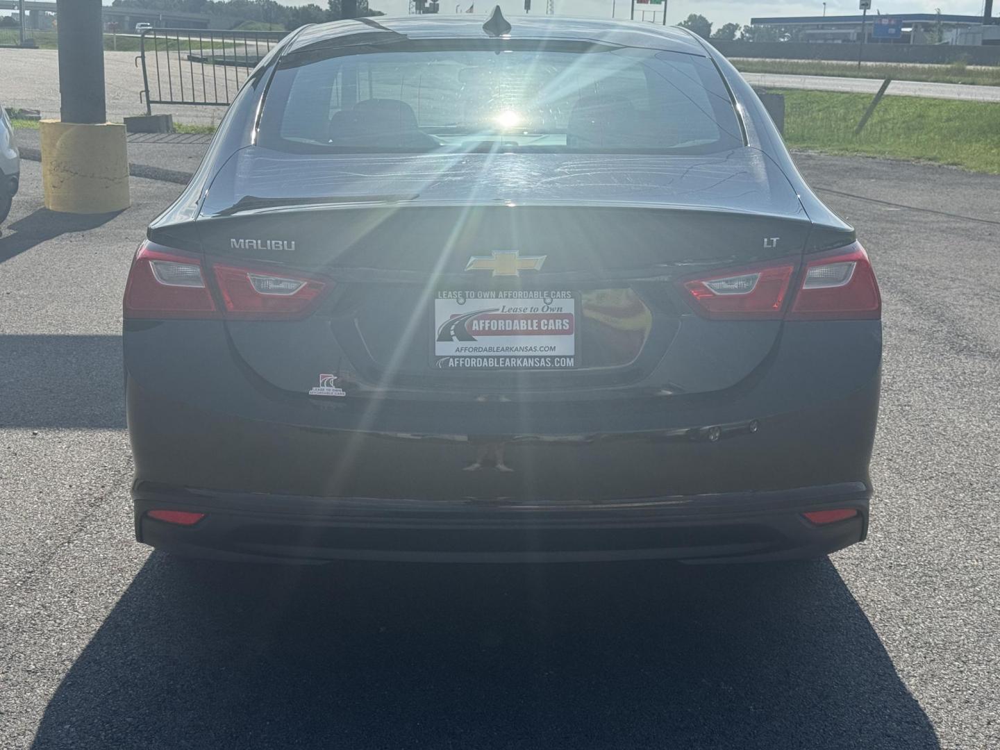 2016 Black Chevrolet Malibu (1G1ZE5ST1GF) with an 4-Cyl, Turbo, 1.5 Liter engine, Automatic, 6-Spd transmission, located at 8008 Warden Rd, Sherwood, AR, 72120, (501) 801-6100, 34.830078, -92.186684 - Photo#6