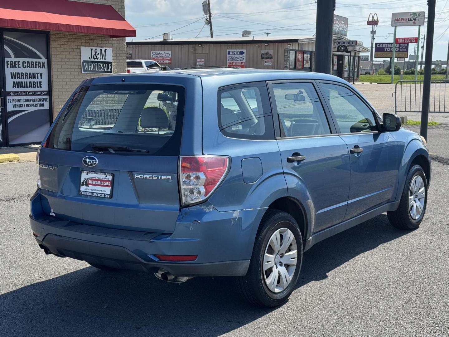2009 Blue Subaru Forester (JF2SH61639H) with an 4-Cyl, 2.5 Liter engine, Automatic, 4-Spd w/Overdrive and SportShift transmission, located at 8008 Warden Rd, Sherwood, AR, 72120, (501) 801-6100, 34.830078, -92.186684 - Photo#7
