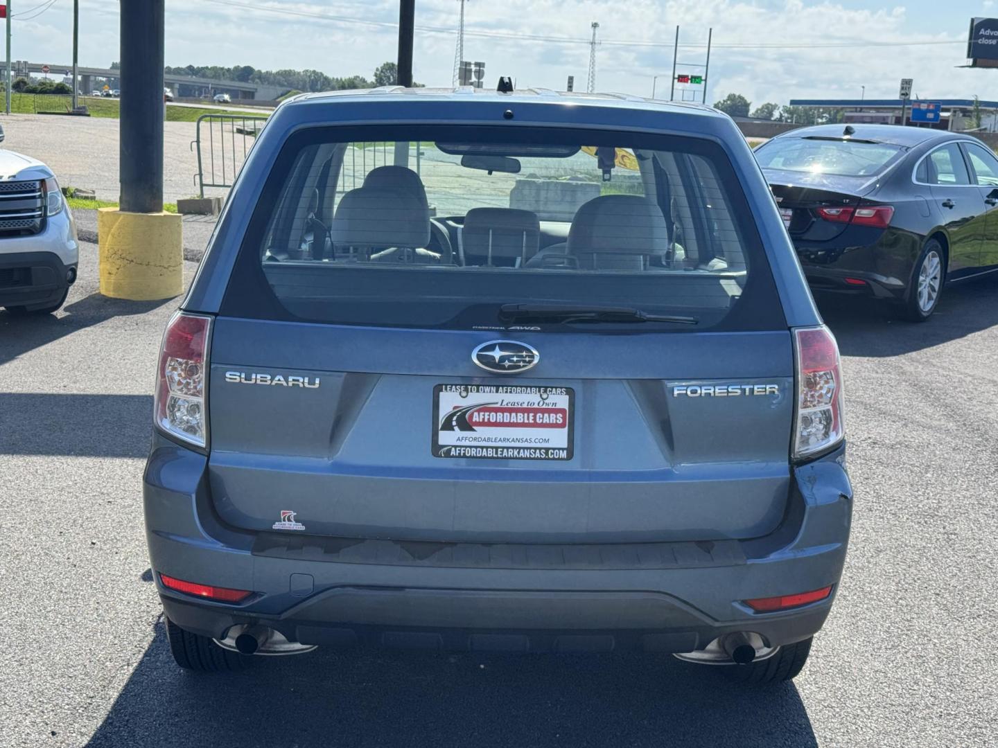 2009 Blue Subaru Forester (JF2SH61639H) with an 4-Cyl, 2.5 Liter engine, Automatic, 4-Spd w/Overdrive and SportShift transmission, located at 8008 Warden Rd, Sherwood, AR, 72120, (501) 801-6100, 34.830078, -92.186684 - Photo#6