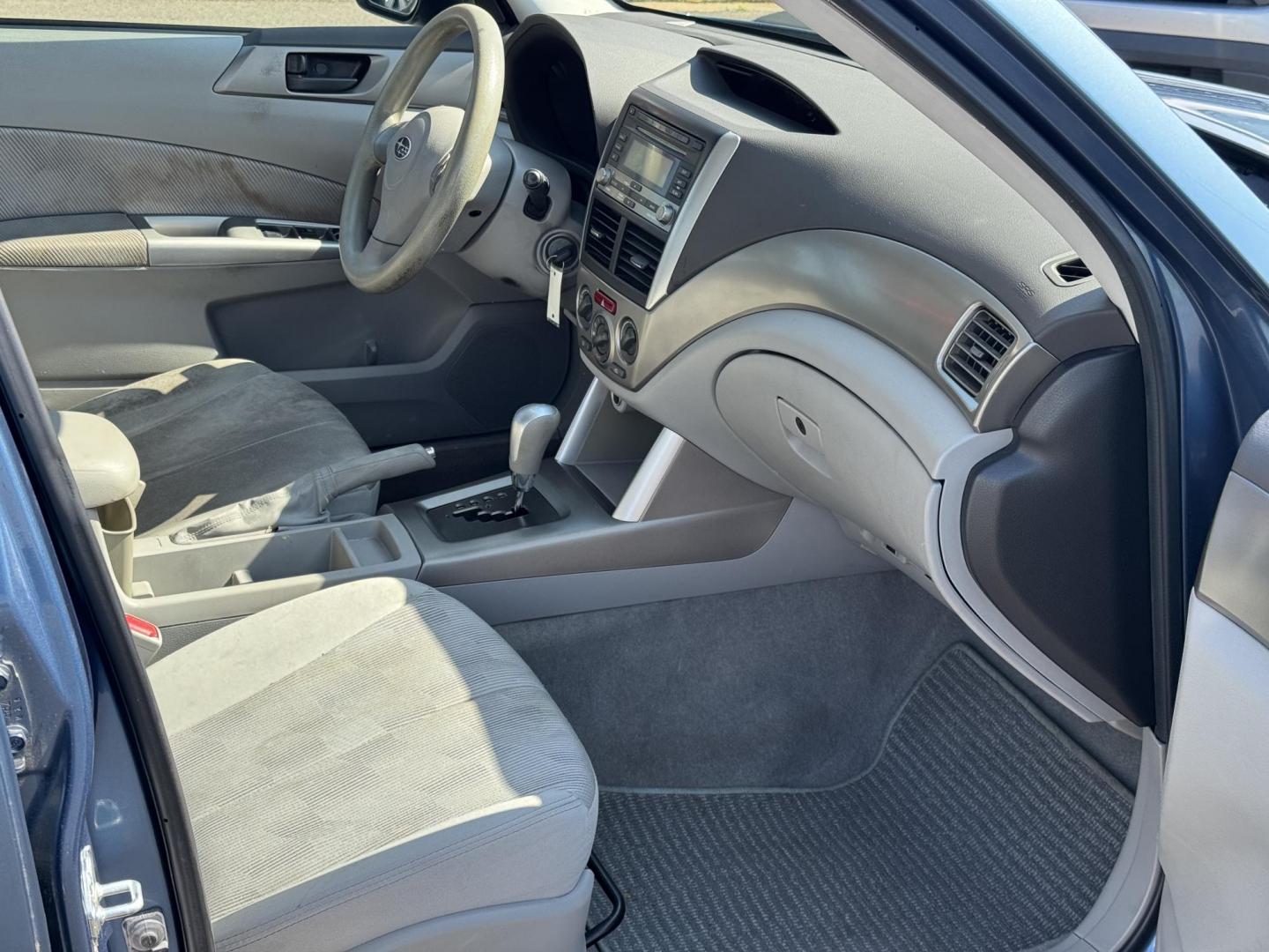 2009 Blue Subaru Forester (JF2SH61639H) with an 4-Cyl, 2.5 Liter engine, Automatic, 4-Spd w/Overdrive and SportShift transmission, located at 8008 Warden Rd, Sherwood, AR, 72120, (501) 801-6100, 34.830078, -92.186684 - Photo#8