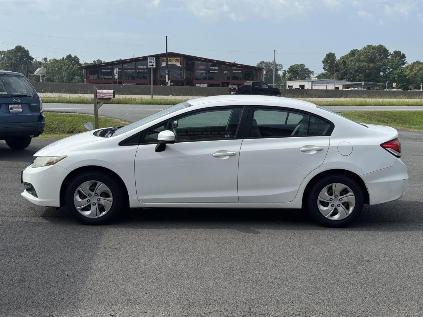 2014 White Honda Civic (19XFB2F55EE) with an 4-Cyl, i-VTEC, 1.8 Liter engine, Automatic, CVT transmission, located at 8008 Warden Rd, Sherwood, AR, 72120, (501) 801-6100, 34.830078, -92.186684 - Photo#4