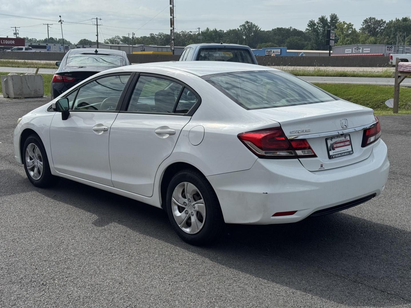 2014 White Honda Civic (19XFB2F55EE) with an 4-Cyl, i-VTEC, 1.8 Liter engine, Automatic, CVT transmission, located at 8008 Warden Rd, Sherwood, AR, 72120, (501) 801-6100, 34.830078, -92.186684 - Photo#5