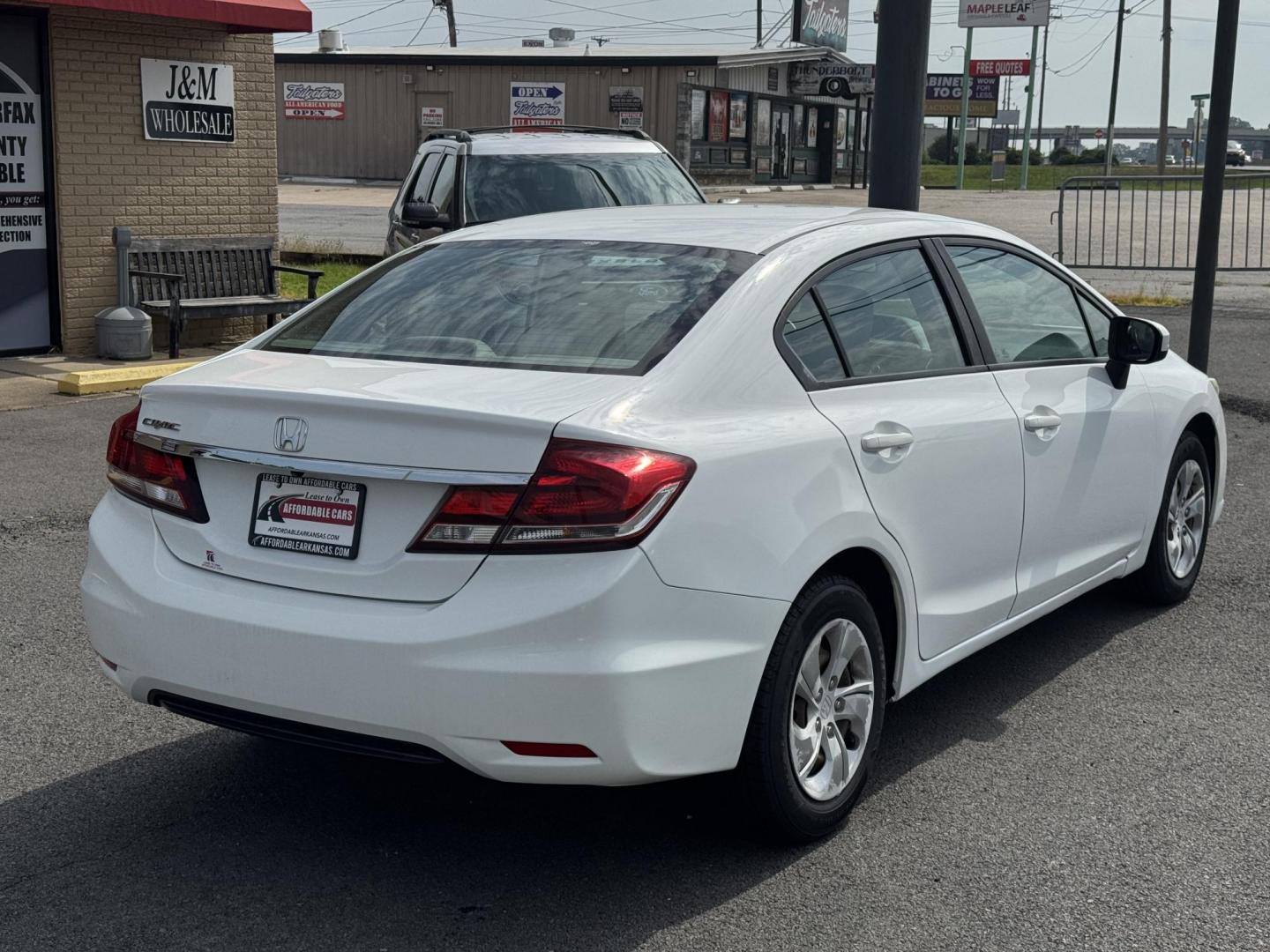 2014 White Honda Civic (19XFB2F55EE) with an 4-Cyl, i-VTEC, 1.8 Liter engine, Automatic, CVT transmission, located at 8008 Warden Rd, Sherwood, AR, 72120, (501) 801-6100, 34.830078, -92.186684 - Photo#7
