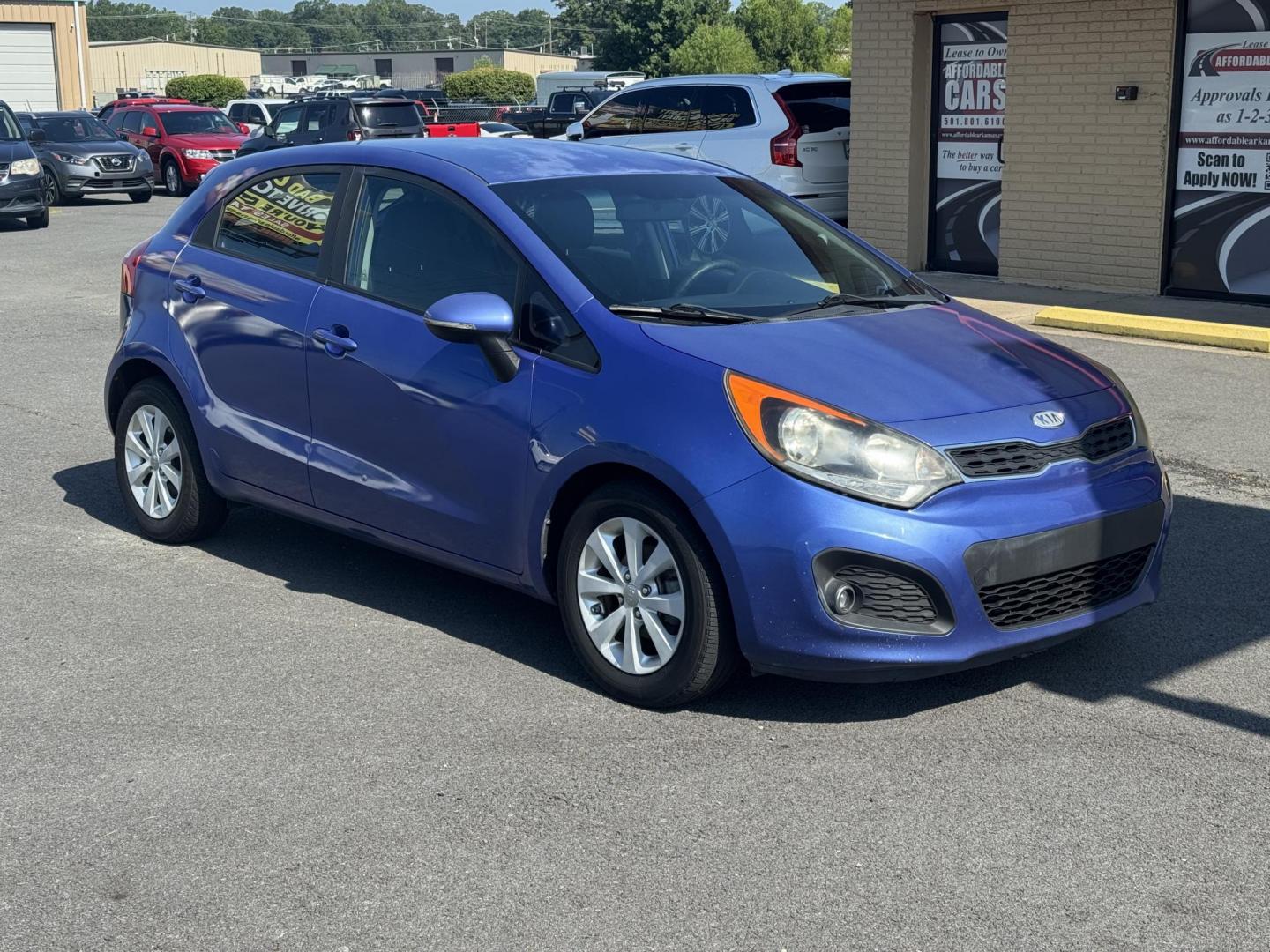 2012 Blue Kia Rio (KNADN5A34C6) with an 4-Cyl, 1.6 Liter engine, Automatic, 6-Spd w/Overdrive transmission, located at 8008 Warden Rd, Sherwood, AR, 72120, (501) 801-6100, 34.830078, -92.186684 - Photo#1