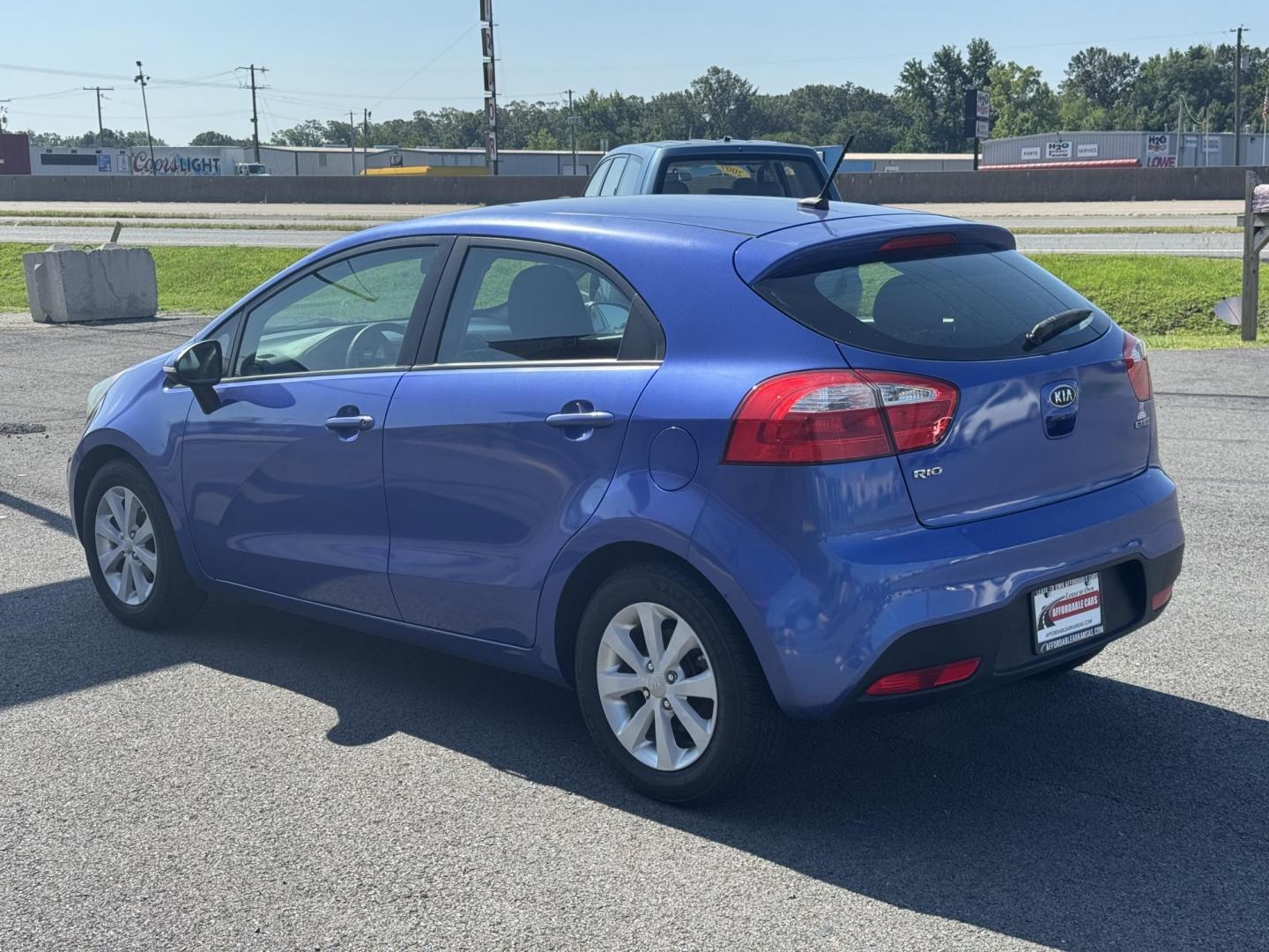 2012 Blue Kia Rio (KNADN5A34C6) with an 4-Cyl, 1.6 Liter engine, Automatic, 6-Spd w/Overdrive transmission, located at 8008 Warden Rd, Sherwood, AR, 72120, (501) 801-6100, 34.830078, -92.186684 - Photo#5