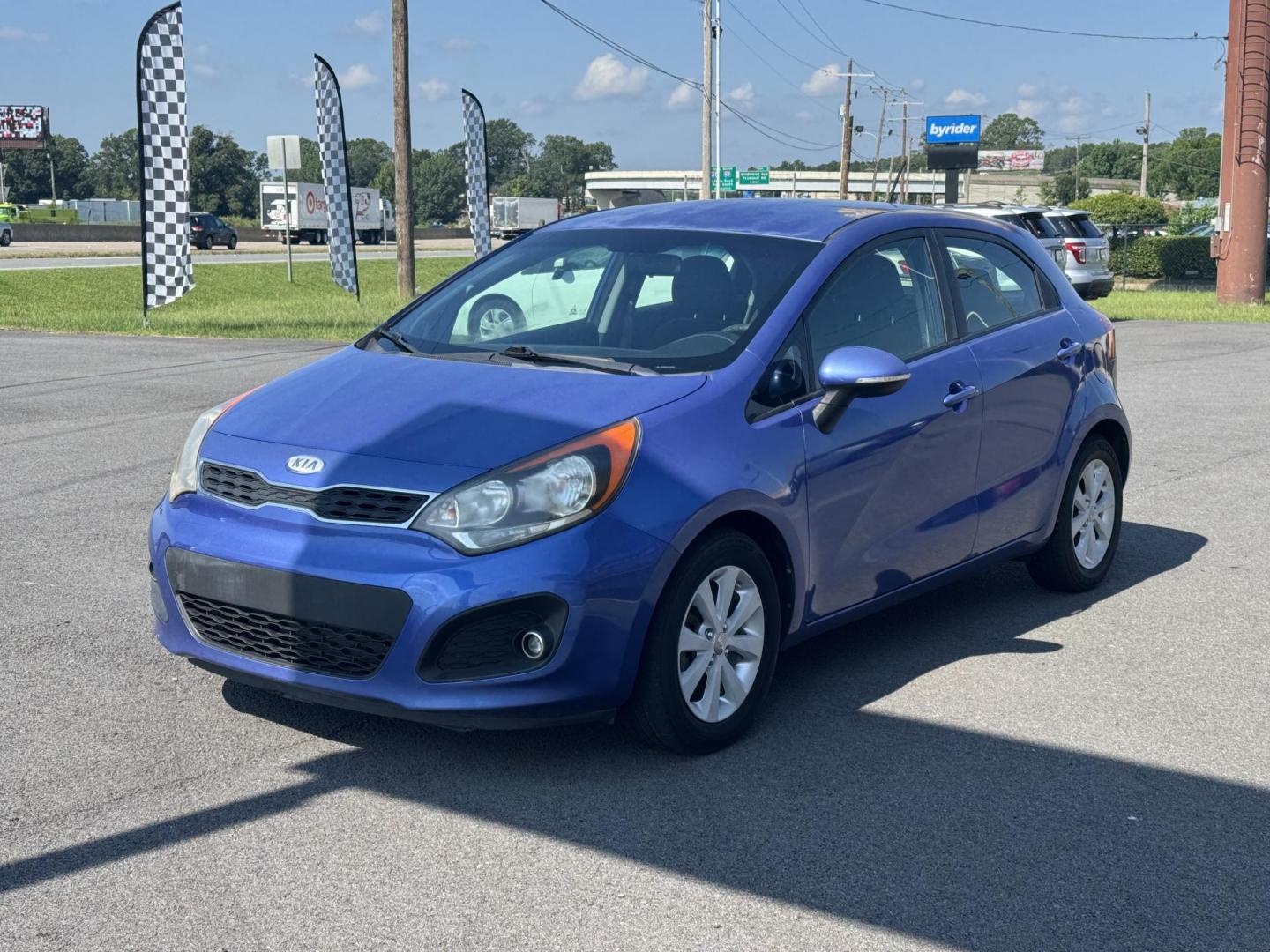 2012 Blue Kia Rio (KNADN5A34C6) with an 4-Cyl, 1.6 Liter engine, Automatic, 6-Spd w/Overdrive transmission, located at 8008 Warden Rd, Sherwood, AR, 72120, (501) 801-6100, 34.830078, -92.186684 - Photo#3
