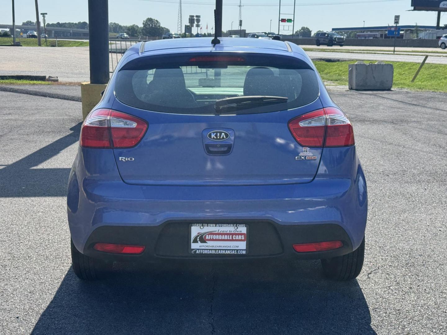 2012 Blue Kia Rio (KNADN5A34C6) with an 4-Cyl, 1.6 Liter engine, Automatic, 6-Spd w/Overdrive transmission, located at 8008 Warden Rd, Sherwood, AR, 72120, (501) 801-6100, 34.830078, -92.186684 - Photo#6