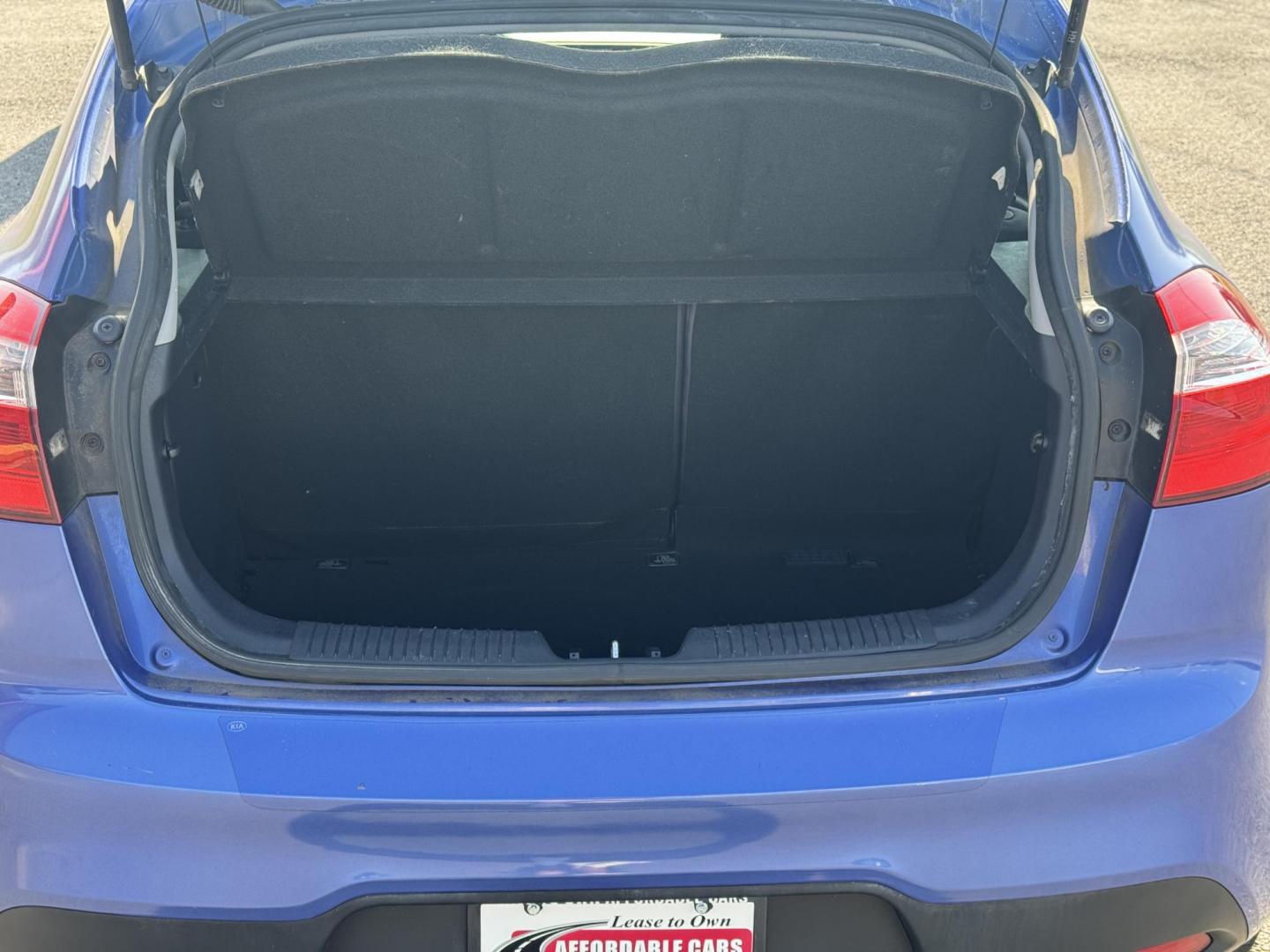 2012 Blue Kia Rio (KNADN5A34C6) with an 4-Cyl, 1.6 Liter engine, Automatic, 6-Spd w/Overdrive transmission, located at 8008 Warden Rd, Sherwood, AR, 72120, (501) 801-6100, 34.830078, -92.186684 - Photo#10