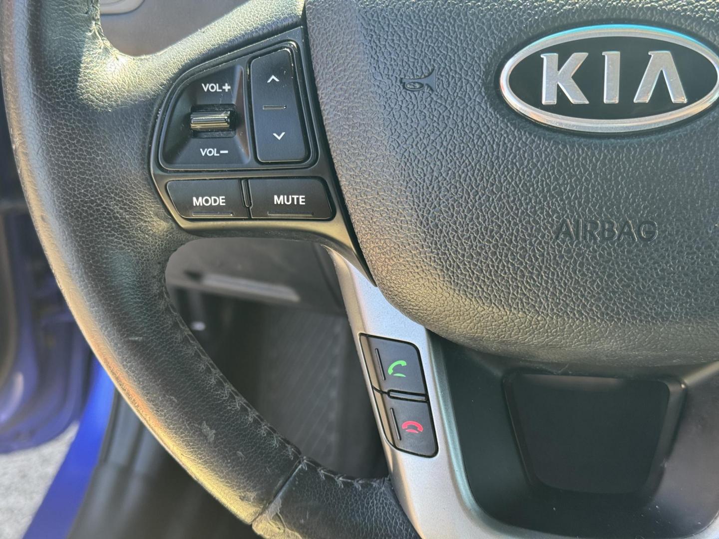 2012 Blue Kia Rio (KNADN5A34C6) with an 4-Cyl, 1.6 Liter engine, Automatic, 6-Spd w/Overdrive transmission, located at 8008 Warden Rd, Sherwood, AR, 72120, (501) 801-6100, 34.830078, -92.186684 - Photo#17