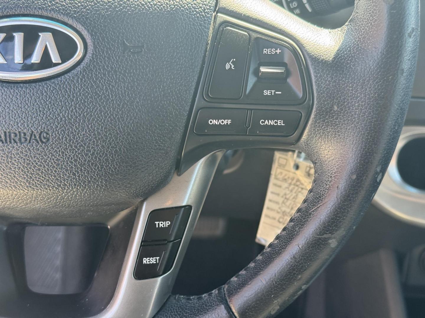 2012 Blue Kia Rio (KNADN5A34C6) with an 4-Cyl, 1.6 Liter engine, Automatic, 6-Spd w/Overdrive transmission, located at 8008 Warden Rd, Sherwood, AR, 72120, (501) 801-6100, 34.830078, -92.186684 - Photo#18