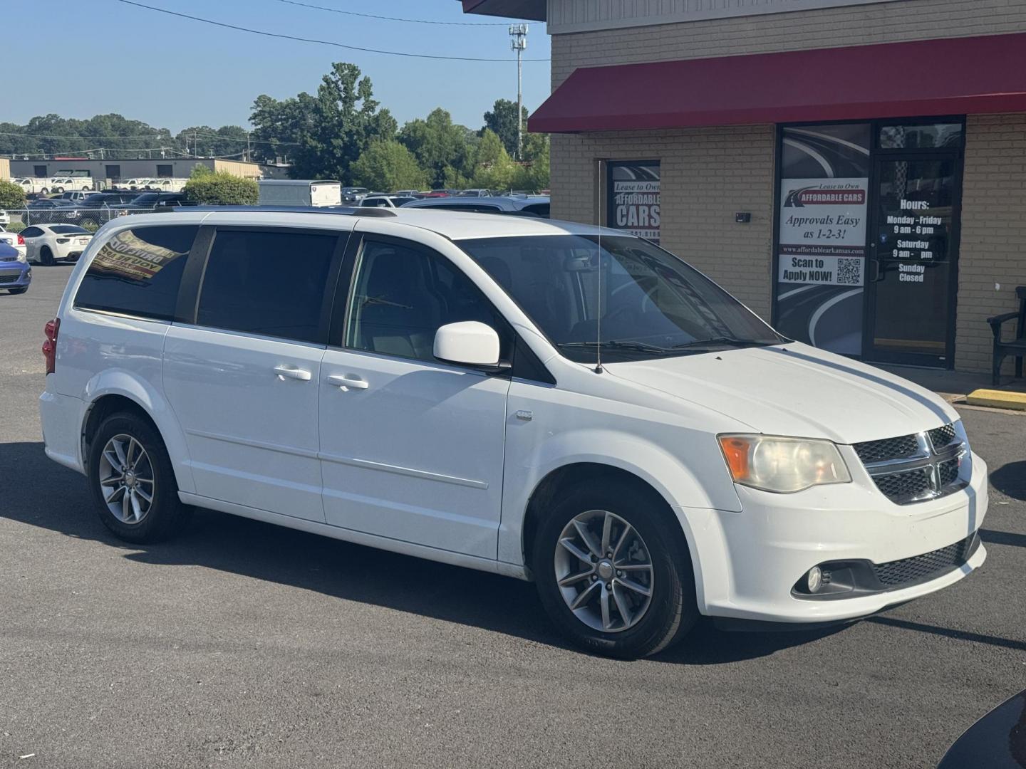 2014 White Dodge Grand Caravan Passenger (2C4RDGCG8ER) with an V6, Flex Fuel, 3.6 Liter engine, Automatic, 6-Spd transmission, located at 8008 Warden Rd, Sherwood, AR, 72120, (501) 801-6100, 34.830078, -92.186684 - Photo#1