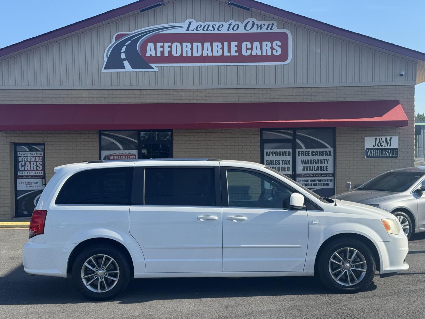 2014 White Dodge Grand Caravan Passenger (2C4RDGCG8ER) with an V6, Flex Fuel, 3.6 Liter engine, Automatic, 6-Spd transmission, located at 8008 Warden Rd, Sherwood, AR, 72120, (501) 801-6100, 34.830078, -92.186684 - Photo#0