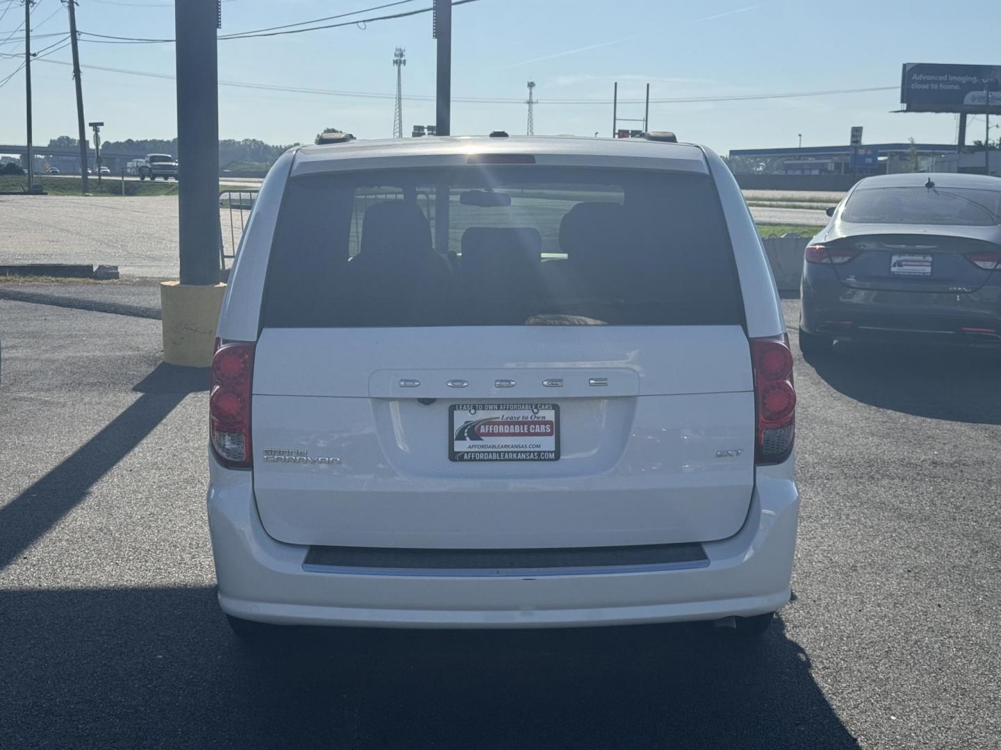 2014 White Dodge Grand Caravan Passenger (2C4RDGCG8ER) with an V6, Flex Fuel, 3.6 Liter engine, Automatic, 6-Spd transmission, located at 8008 Warden Rd, Sherwood, AR, 72120, (501) 801-6100, 34.830078, -92.186684 - Photo#6