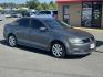 2014 Gray Volkswagen Jetta (3VWD17AJ0EM) with an 4-Cyl, Turbo, 1.8 Liter engine, Auto 6-Spd w/Tptrnc and Spt transmission, located at 8008 Warden Rd, Sherwood, AR, 72120, (501) 801-6100, 34.830078, -92.186684 - Photo#1
