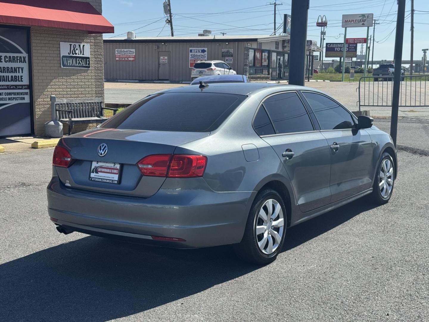 2014 Gray Volkswagen Jetta (3VWD17AJ0EM) with an 4-Cyl, Turbo, 1.8 Liter engine, Auto 6-Spd w/Tptrnc and Spt transmission, located at 8008 Warden Rd, Sherwood, AR, 72120, (501) 801-6100, 34.830078, -92.186684 - Photo#7