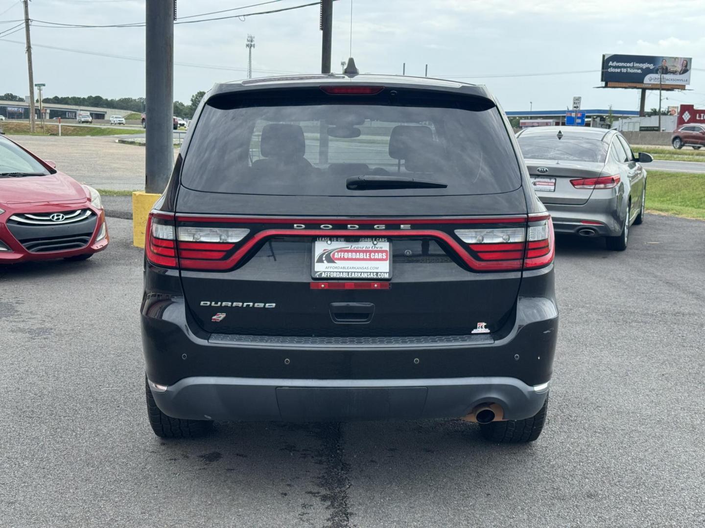 2019 Black Dodge Durango (1C4RDJFGXKC) with an 3.6L engine, located at 8008 Warden Rd, Sherwood, AR, 72120, (501) 801-6100, 34.830078, -92.186684 - Photo#6