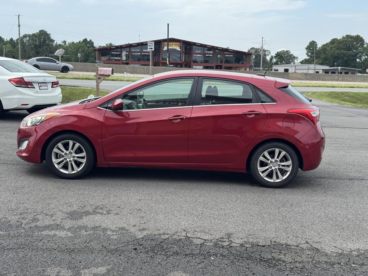 2015 Red Hyundai Elantra GT (KMHD35LH4FU) with an 4-Cyl, 2.0 Liter engine, Auto, 6-Spd w/Shiftronic transmission, located at 8008 Warden Rd, Sherwood, AR, 72120, (501) 801-6100, 34.830078, -92.186684 - Photo#4
