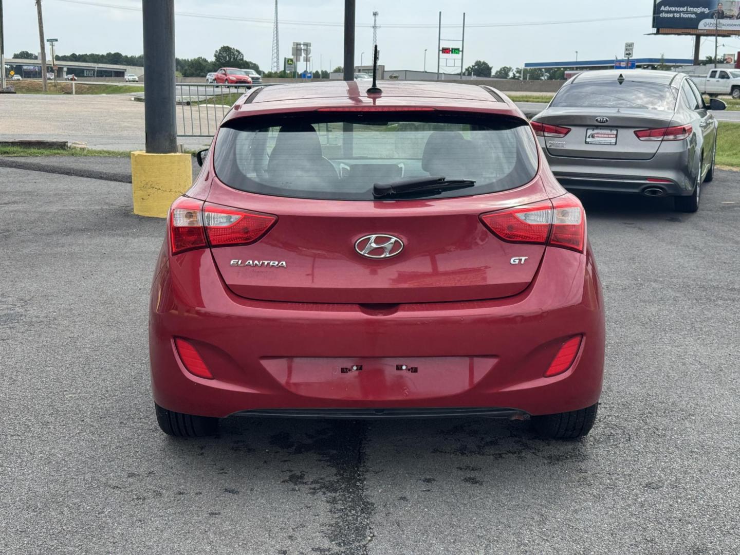 2015 Red Hyundai Elantra GT (KMHD35LH4FU) with an 4-Cyl, 2.0 Liter engine, Auto, 6-Spd w/Shiftronic transmission, located at 8008 Warden Rd, Sherwood, AR, 72120, (501) 801-6100, 34.830078, -92.186684 - Photo#6