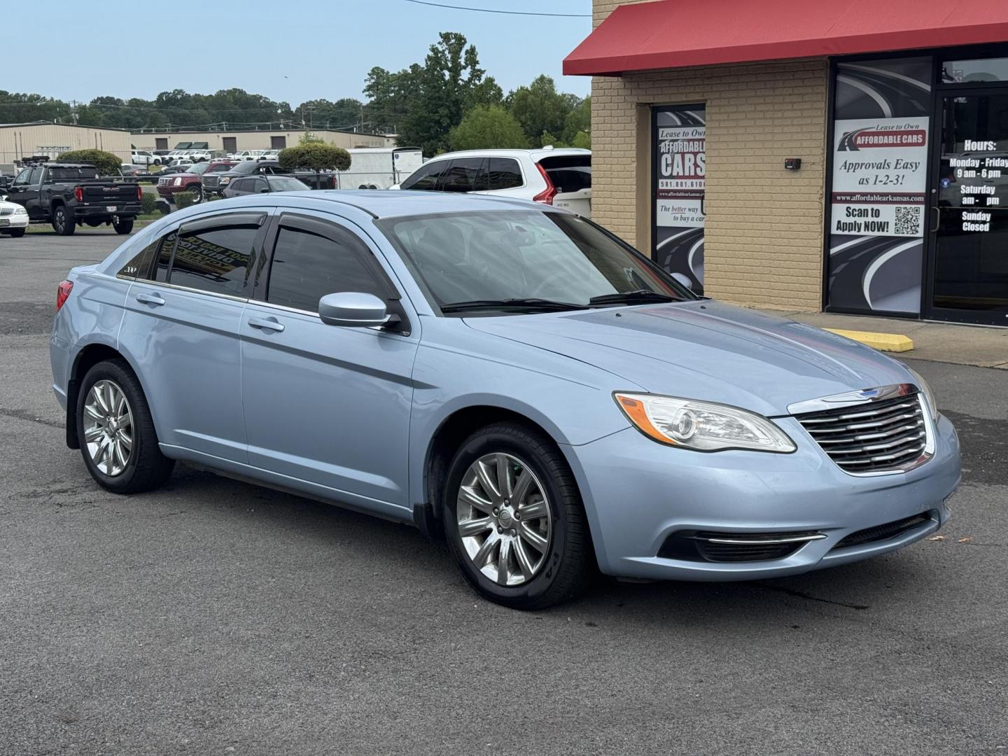 2013 Blue Chrysler 200 (1C3CCBBB2DN) with an 4-Cyl, 2.4 Liter engine, Automatic, 6-Spd w/AutoStick transmission, located at 8008 Warden Rd, Sherwood, AR, 72120, (501) 801-6100, 34.830078, -92.186684 - Photo#1