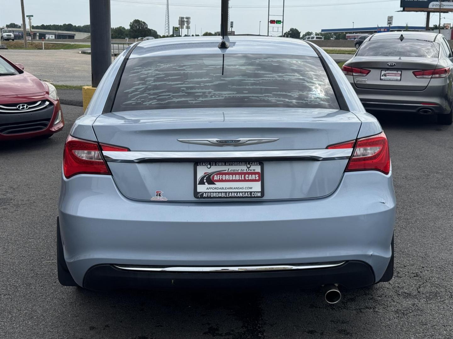 2013 Blue Chrysler 200 (1C3CCBBB2DN) with an 4-Cyl, 2.4 Liter engine, Automatic, 6-Spd w/AutoStick transmission, located at 8008 Warden Rd, Sherwood, AR, 72120, (501) 801-6100, 34.830078, -92.186684 - Photo#6