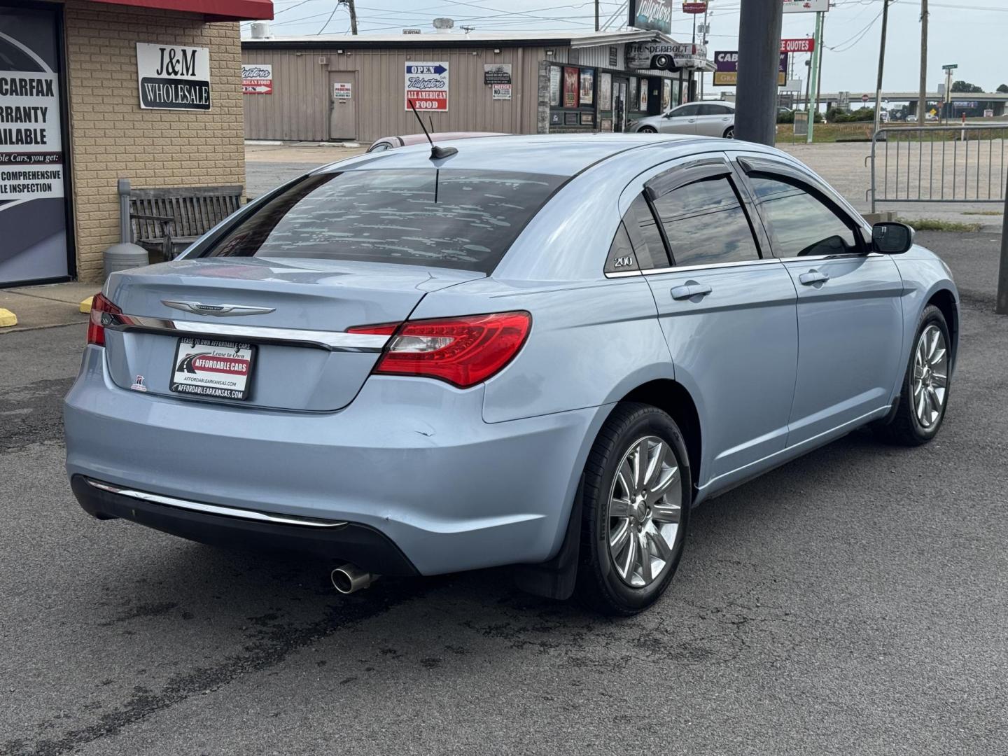 2013 Blue Chrysler 200 (1C3CCBBB2DN) with an 4-Cyl, 2.4 Liter engine, Automatic, 6-Spd w/AutoStick transmission, located at 8008 Warden Rd, Sherwood, AR, 72120, (501) 801-6100, 34.830078, -92.186684 - Photo#7