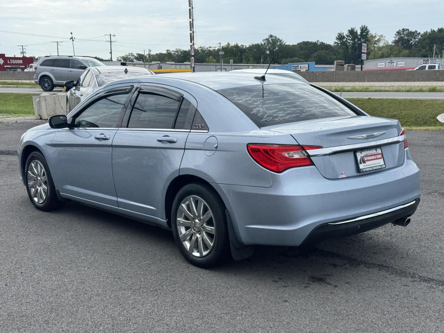 2013 Blue Chrysler 200 (1C3CCBBB2DN) with an 4-Cyl, 2.4 Liter engine, Automatic, 6-Spd w/AutoStick transmission, located at 8008 Warden Rd, Sherwood, AR, 72120, (501) 801-6100, 34.830078, -92.186684 - Photo#5