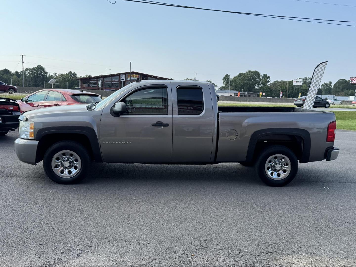 2009 Gray Chevrolet Silverado 1500 Extended Cab (1GCEC19XX9Z) with an V6, 4.3 Liter engine, Automatic, 4-Spd w/Overdrive transmission, located at 8008 Warden Rd, Sherwood, AR, 72120, (501) 801-6100, 34.830078, -92.186684 - Photo#4