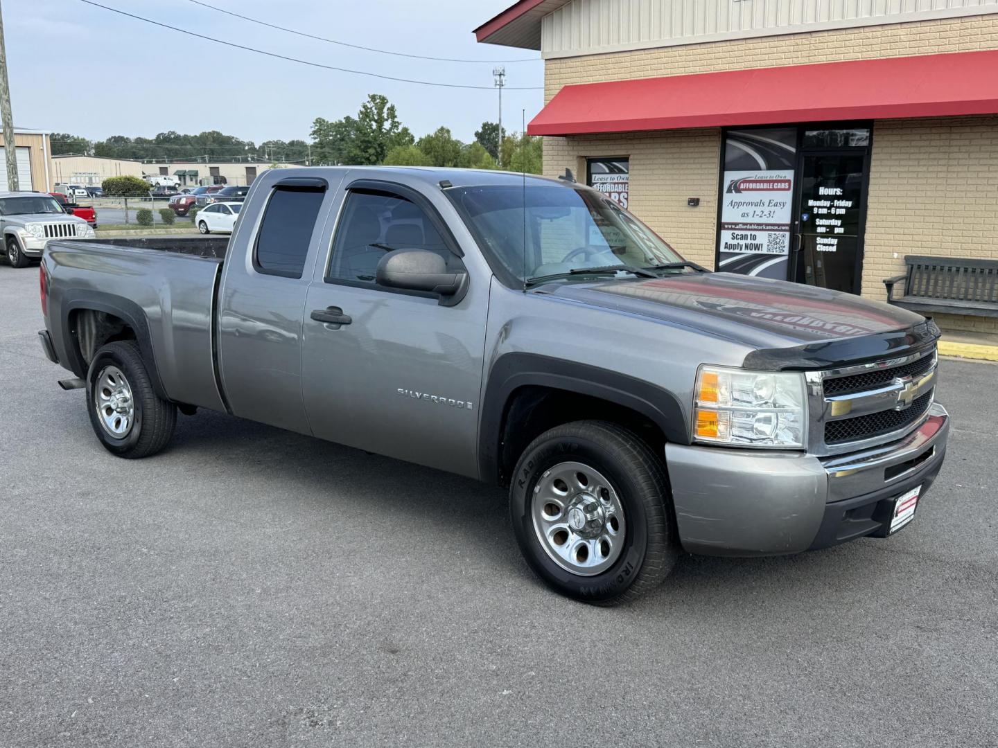 2009 Gray Chevrolet Silverado 1500 Extended Cab (1GCEC19XX9Z) with an V6, 4.3 Liter engine, Automatic, 4-Spd w/Overdrive transmission, located at 8008 Warden Rd, Sherwood, AR, 72120, (501) 801-6100, 34.830078, -92.186684 - Photo#1