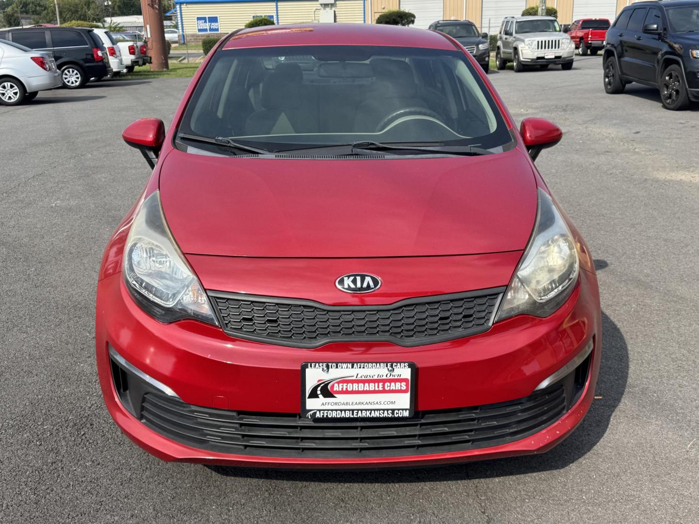 2017 Maroon Kia Rio (KNADM4A37H6) with an 4-Cyl, 1.6 Liter engine, Automatic, 6-Spd transmission, located at 8008 Warden Rd, Sherwood, AR, 72120, (501) 801-6100, 34.830078, -92.186684 - Photo#2