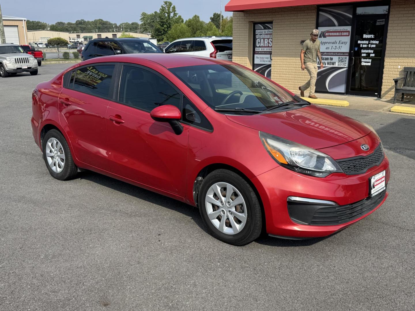 2017 Maroon Kia Rio (KNADM4A37H6) with an 4-Cyl, 1.6 Liter engine, Automatic, 6-Spd transmission, located at 8008 Warden Rd, Sherwood, AR, 72120, (501) 801-6100, 34.830078, -92.186684 - Photo#1