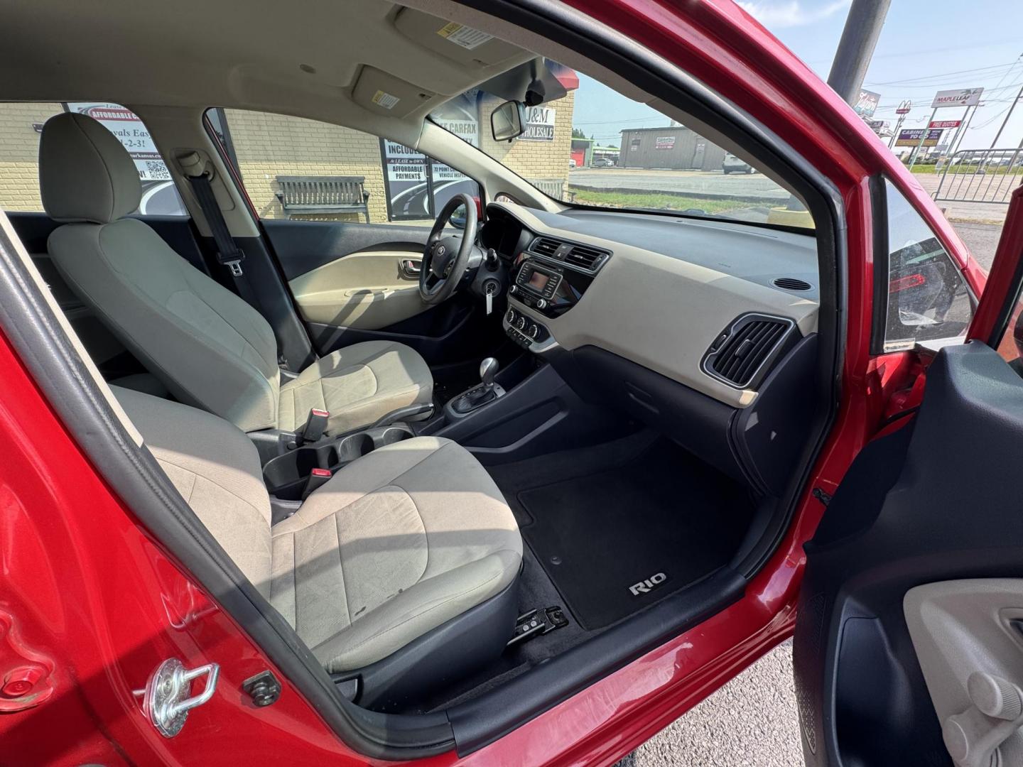 2017 Maroon Kia Rio (KNADM4A37H6) with an 4-Cyl, 1.6 Liter engine, Automatic, 6-Spd transmission, located at 8008 Warden Rd, Sherwood, AR, 72120, (501) 801-6100, 34.830078, -92.186684 - Photo#8