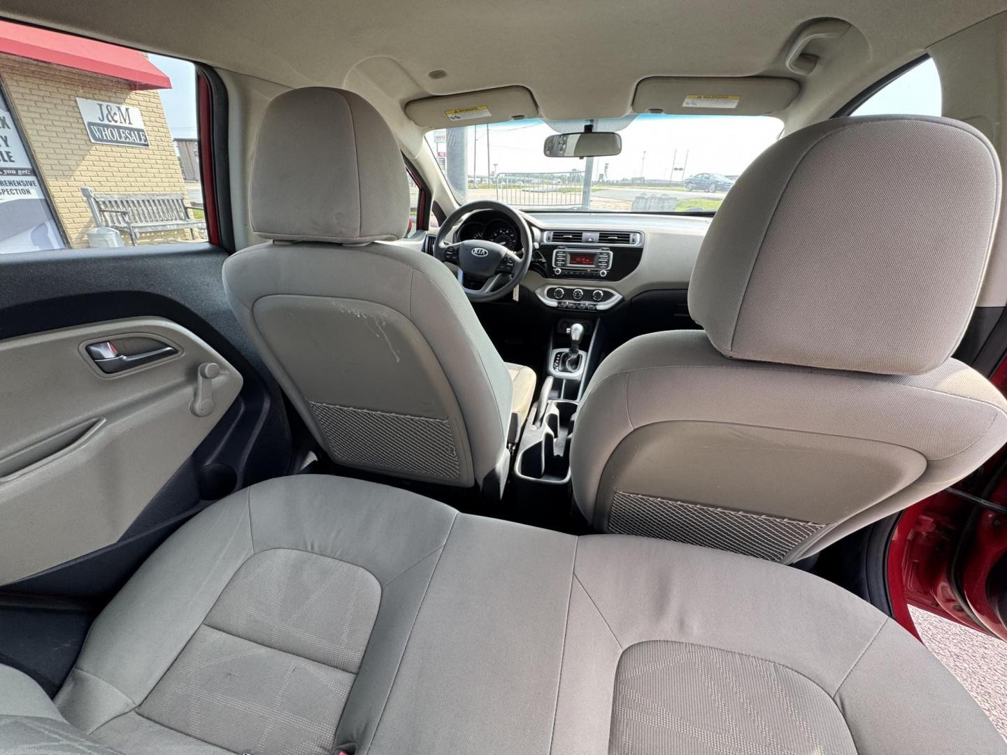 2017 Maroon Kia Rio (KNADM4A37H6) with an 4-Cyl, 1.6 Liter engine, Automatic, 6-Spd transmission, located at 8008 Warden Rd, Sherwood, AR, 72120, (501) 801-6100, 34.830078, -92.186684 - Photo#9