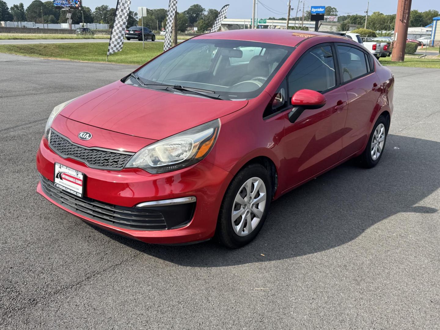 2017 Maroon Kia Rio (KNADM4A37H6) with an 4-Cyl, 1.6 Liter engine, Automatic, 6-Spd transmission, located at 8008 Warden Rd, Sherwood, AR, 72120, (501) 801-6100, 34.830078, -92.186684 - Photo#3
