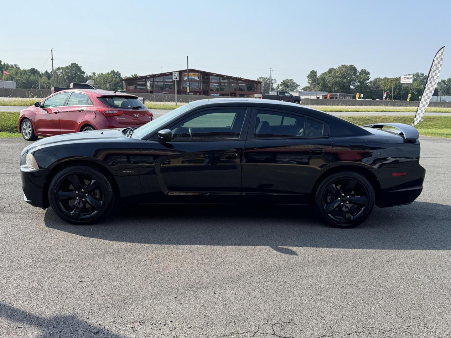 2014 Black Dodge Charger (2C3CDXCT3EH) with an V8, HEMI, 5.7 Liter engine, Automatic, 5-Spd transmission, located at 8008 Warden Rd, Sherwood, AR, 72120, (501) 801-6100, 34.830078, -92.186684 - Photo#4