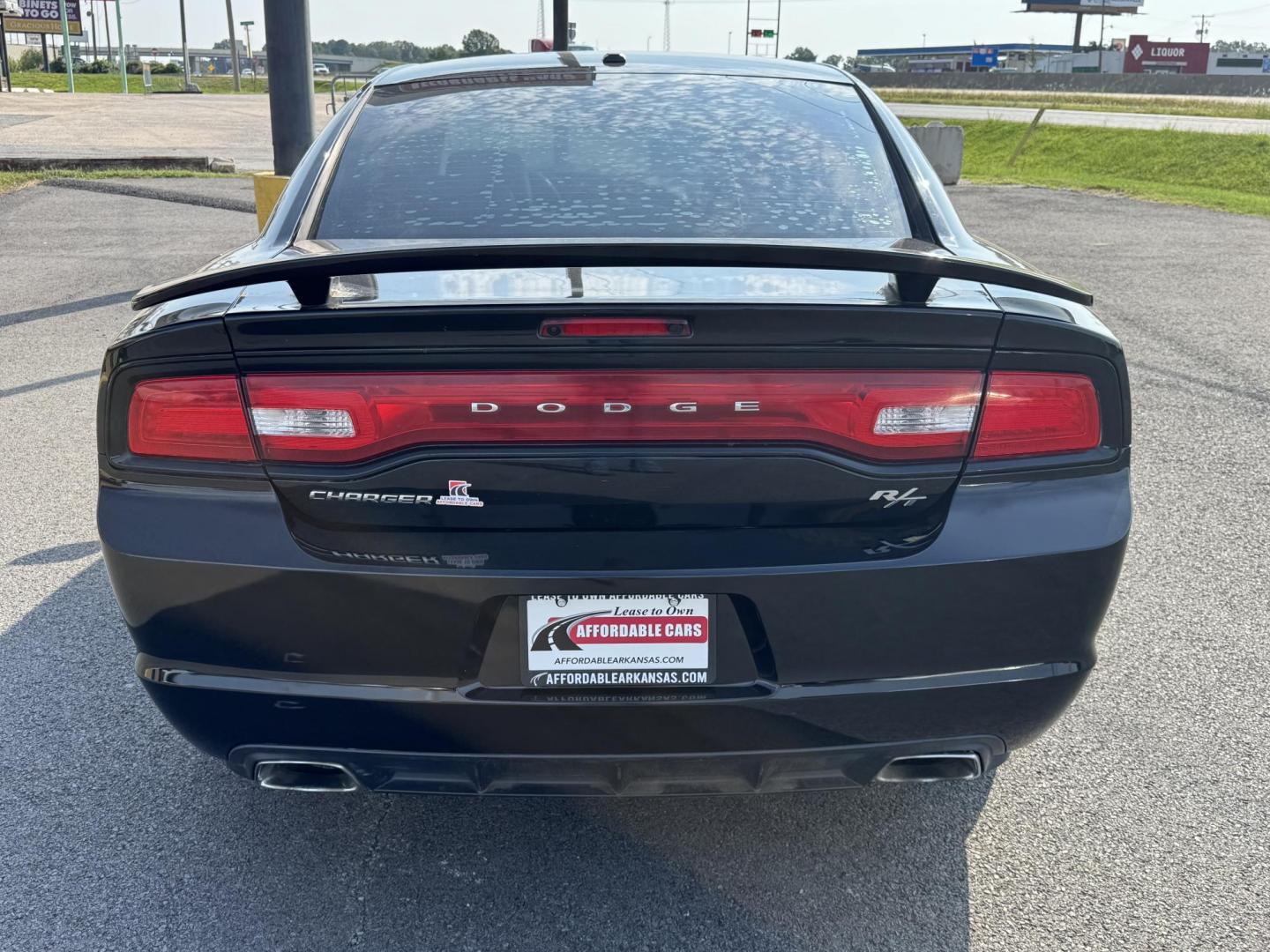 2014 Black Dodge Charger (2C3CDXCT3EH) with an V8, HEMI, 5.7 Liter engine, Automatic, 5-Spd transmission, located at 8008 Warden Rd, Sherwood, AR, 72120, (501) 801-6100, 34.830078, -92.186684 - Photo#6
