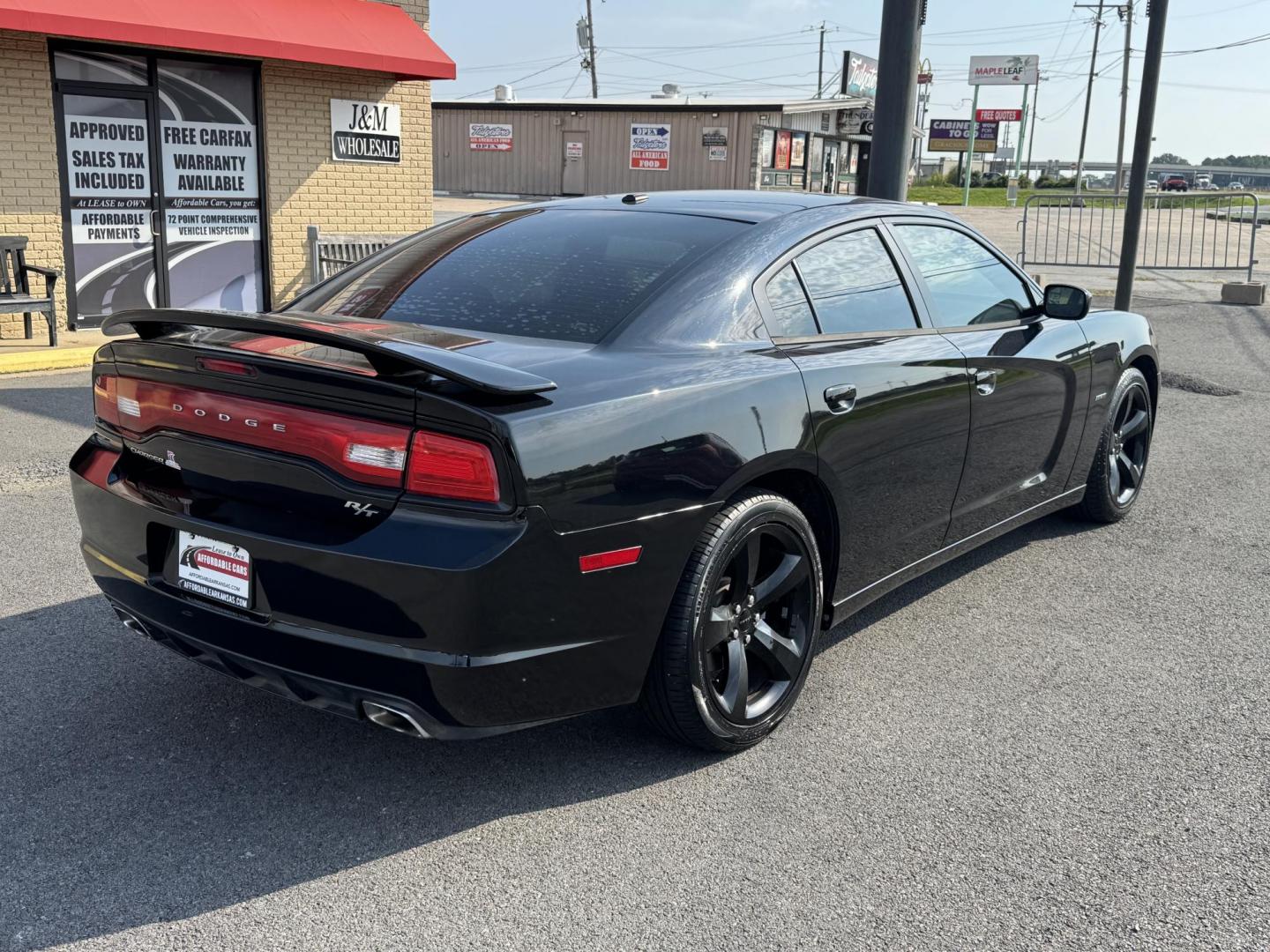 2014 Black Dodge Charger (2C3CDXCT3EH) with an V8, HEMI, 5.7 Liter engine, Automatic, 5-Spd transmission, located at 8008 Warden Rd, Sherwood, AR, 72120, (501) 801-6100, 34.830078, -92.186684 - Photo#7