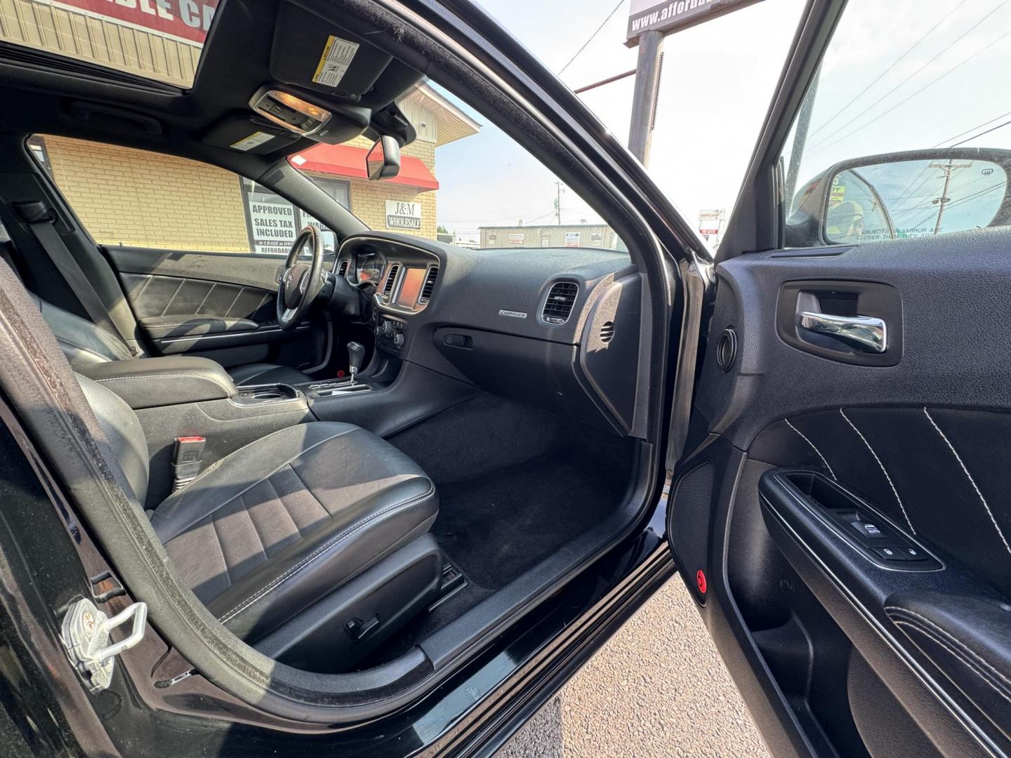 2014 Black Dodge Charger (2C3CDXCT3EH) with an V8, HEMI, 5.7 Liter engine, Automatic, 5-Spd transmission, located at 8008 Warden Rd, Sherwood, AR, 72120, (501) 801-6100, 34.830078, -92.186684 - Photo#8