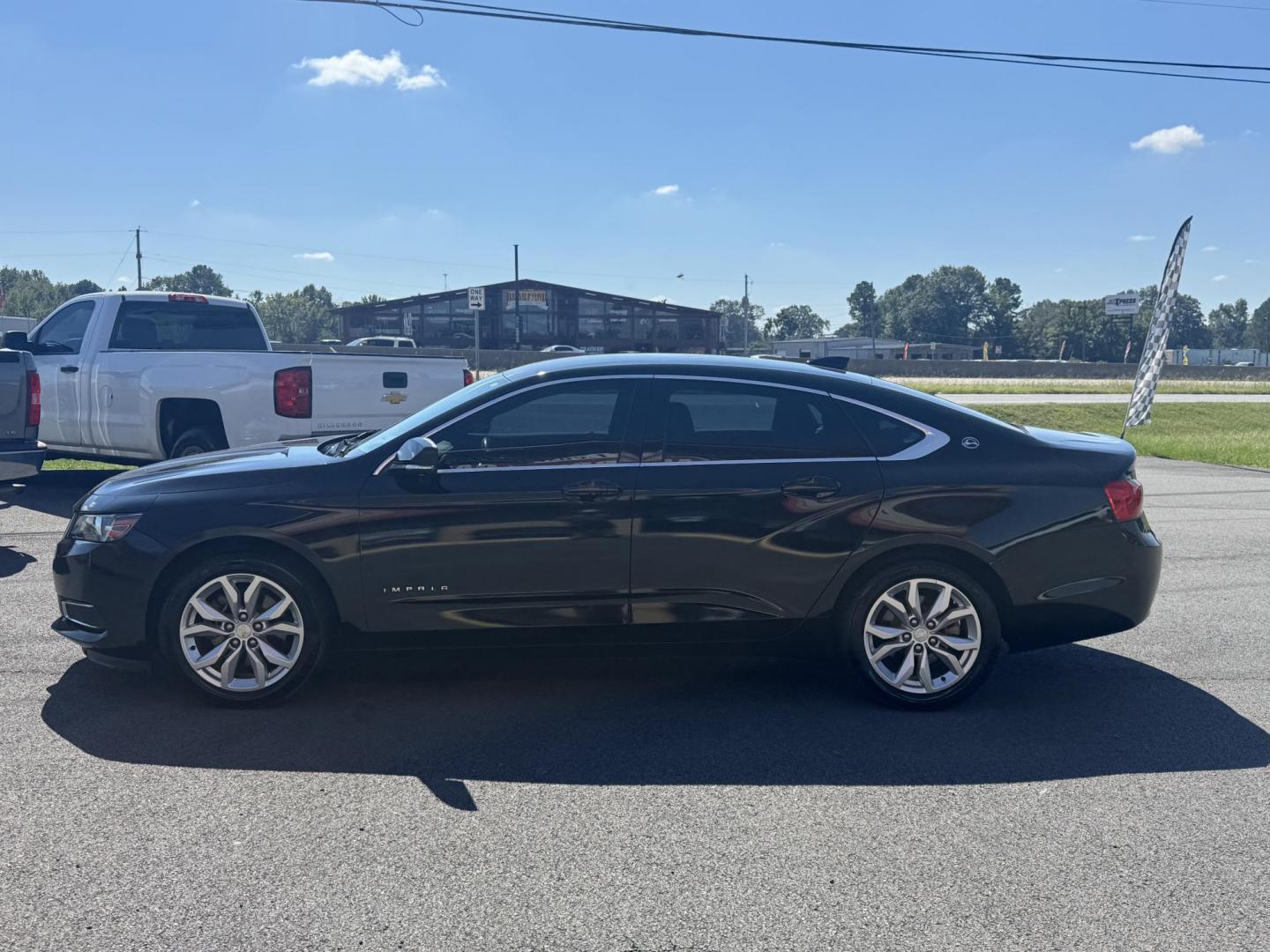2017 Black Chevrolet Impala (1G1105S34HU) with an V6, 3.6 Liter engine, Auto, 6-Spd Overdrive transmission, located at 8008 Warden Rd, Sherwood, AR, 72120, (501) 801-6100, 34.830078, -92.186684 - Photo#4