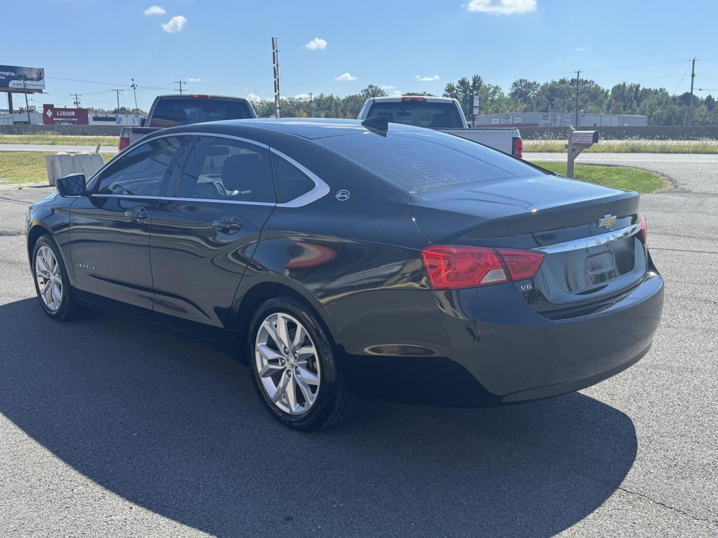 2017 Black Chevrolet Impala (1G1105S34HU) with an V6, 3.6 Liter engine, Auto, 6-Spd Overdrive transmission, located at 8008 Warden Rd, Sherwood, AR, 72120, (501) 801-6100, 34.830078, -92.186684 - Photo#5