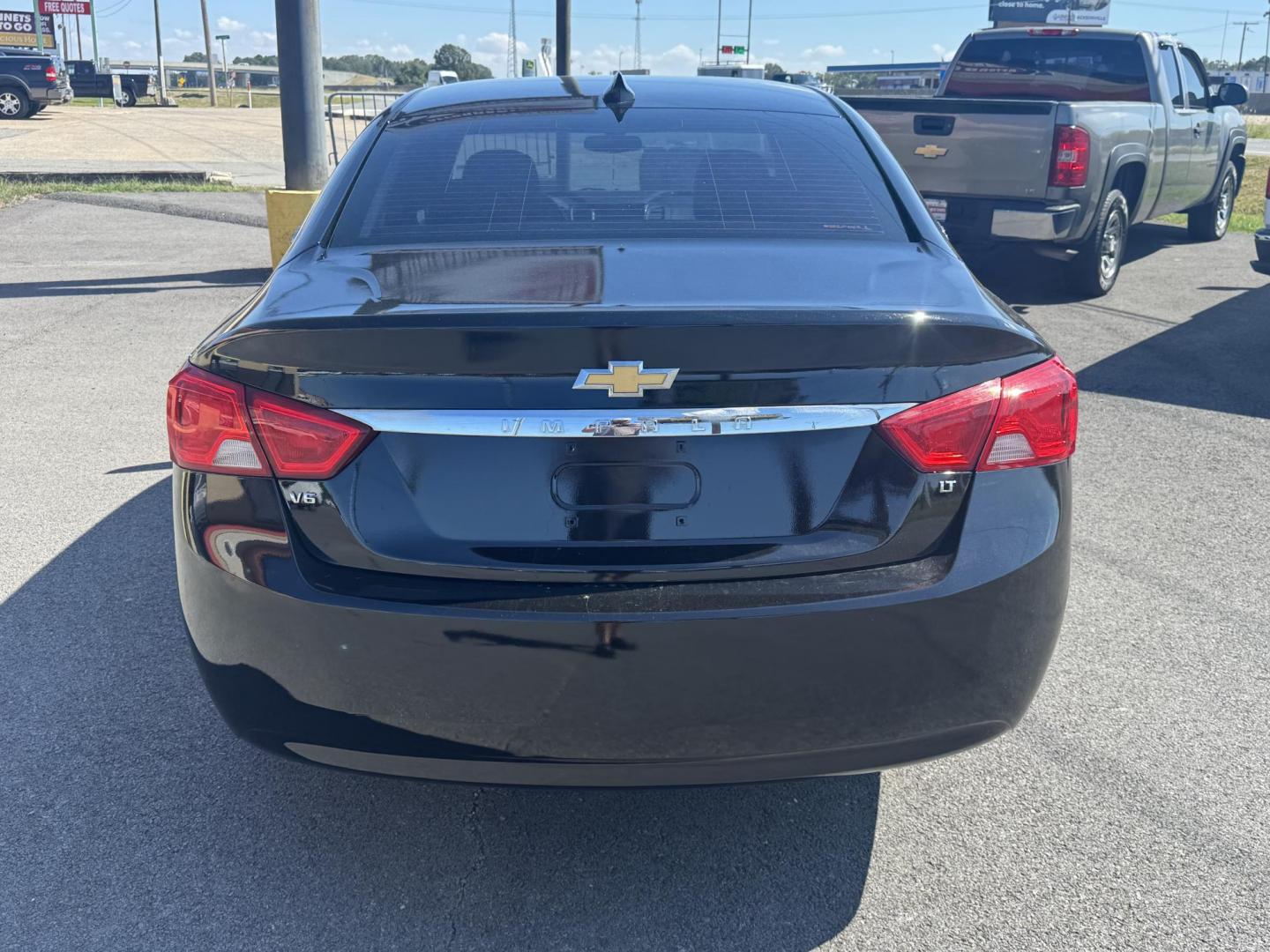 2017 Black Chevrolet Impala (1G1105S34HU) with an V6, 3.6 Liter engine, Auto, 6-Spd Overdrive transmission, located at 8008 Warden Rd, Sherwood, AR, 72120, (501) 801-6100, 34.830078, -92.186684 - Photo#6
