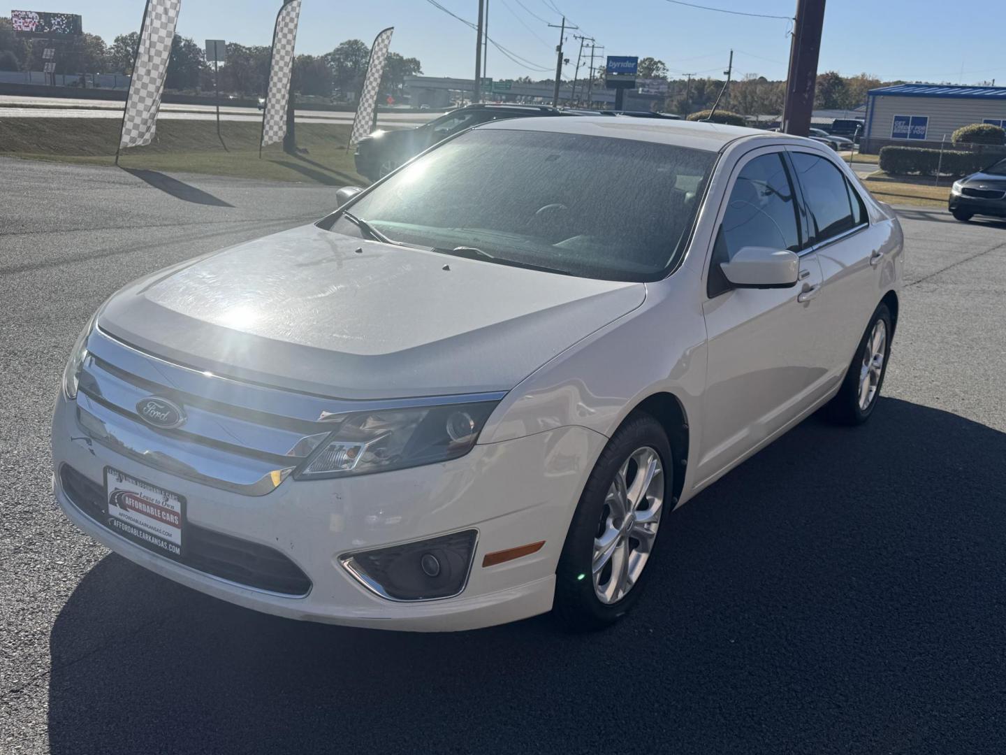 2012 White Ford Fusion (3FAHP0JG5CR) with an 4-Cyl, 2.5 Liter engine, Automatic, 6-Spd w/SelectShift transmission, located at 8008 Warden Rd, Sherwood, AR, 72120, (501) 801-6100, 34.830078, -92.186684 - Photo#3