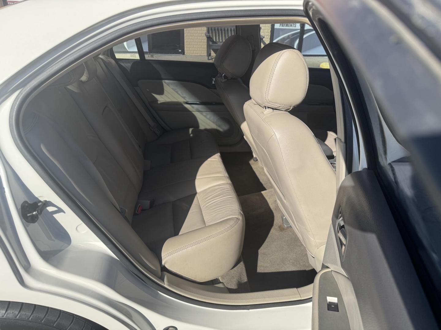 2012 White Ford Fusion (3FAHP0JG5CR) with an 4-Cyl, 2.5 Liter engine, Automatic, 6-Spd w/SelectShift transmission, located at 8008 Warden Rd, Sherwood, AR, 72120, (501) 801-6100, 34.830078, -92.186684 - Photo#9