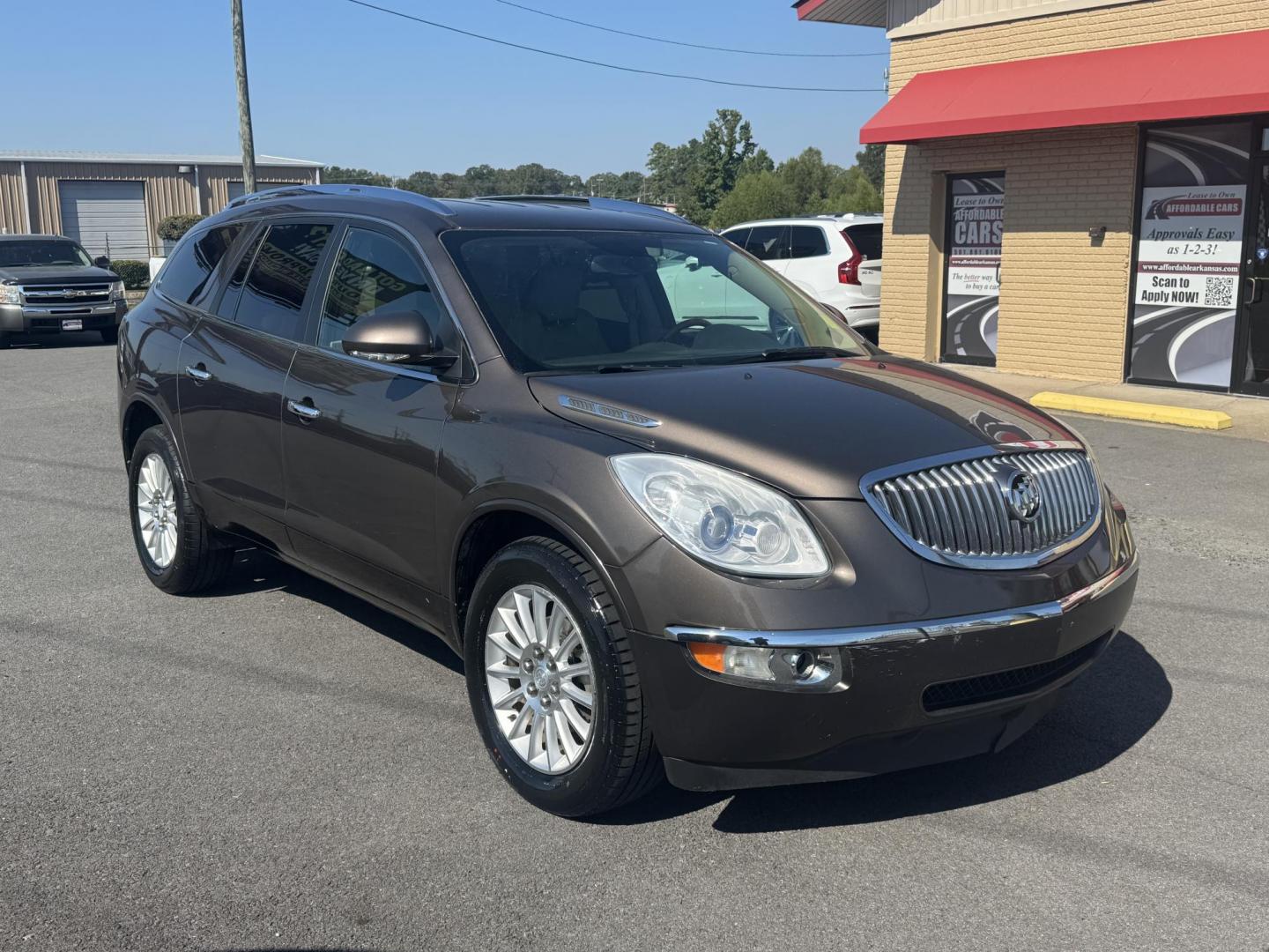 2012 Brown Buick Enclave (5GAKRCED9CJ) with an V6, 3.6 Liter engine, Auto, 6-Spd Overdrive transmission, located at 8008 Warden Rd, Sherwood, AR, 72120, (501) 801-6100, 34.830078, -92.186684 - Photo#1