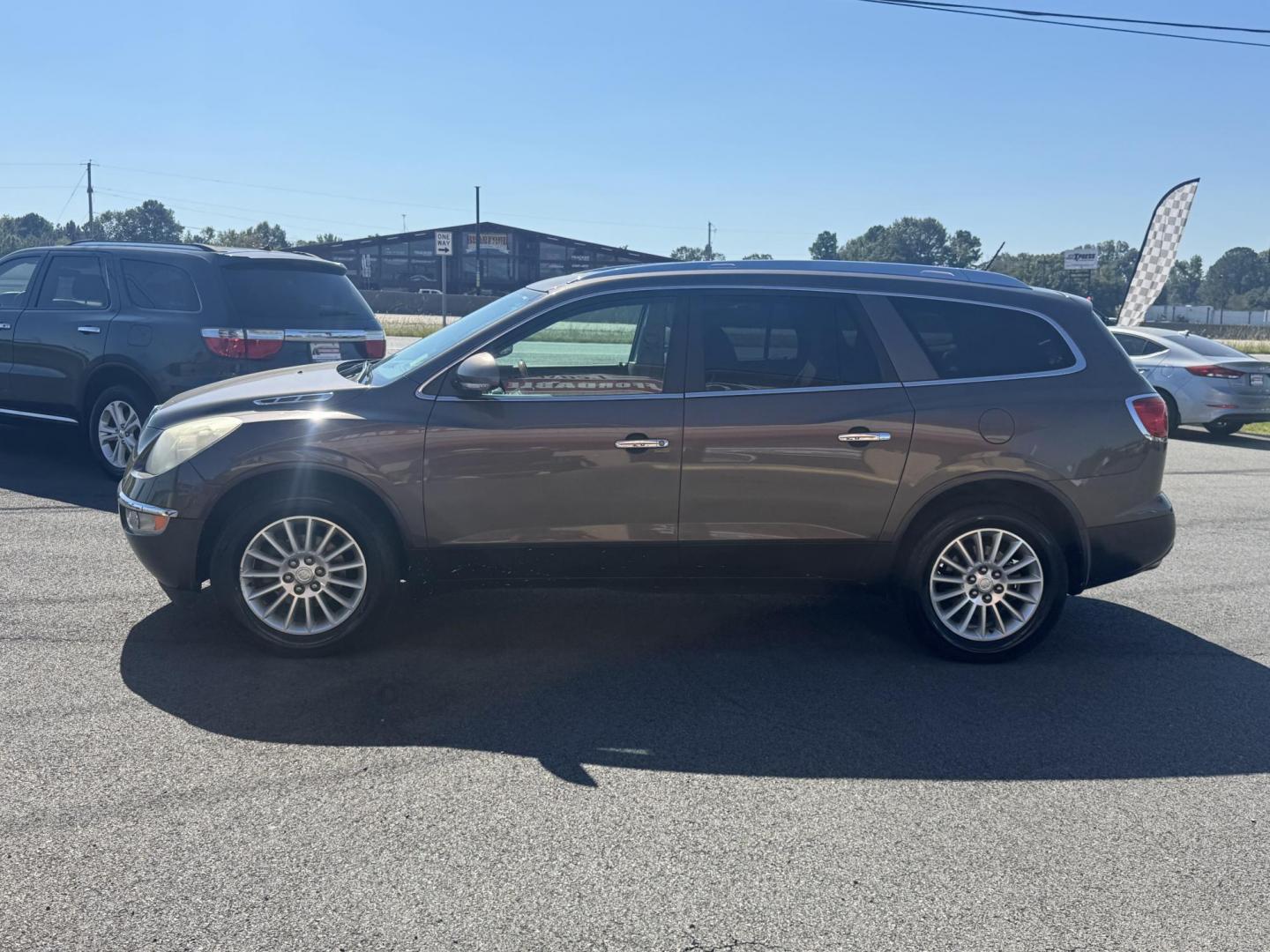 2012 Brown Buick Enclave (5GAKRCED9CJ) with an V6, 3.6 Liter engine, Auto, 6-Spd Overdrive transmission, located at 8008 Warden Rd, Sherwood, AR, 72120, (501) 801-6100, 34.830078, -92.186684 - Photo#4