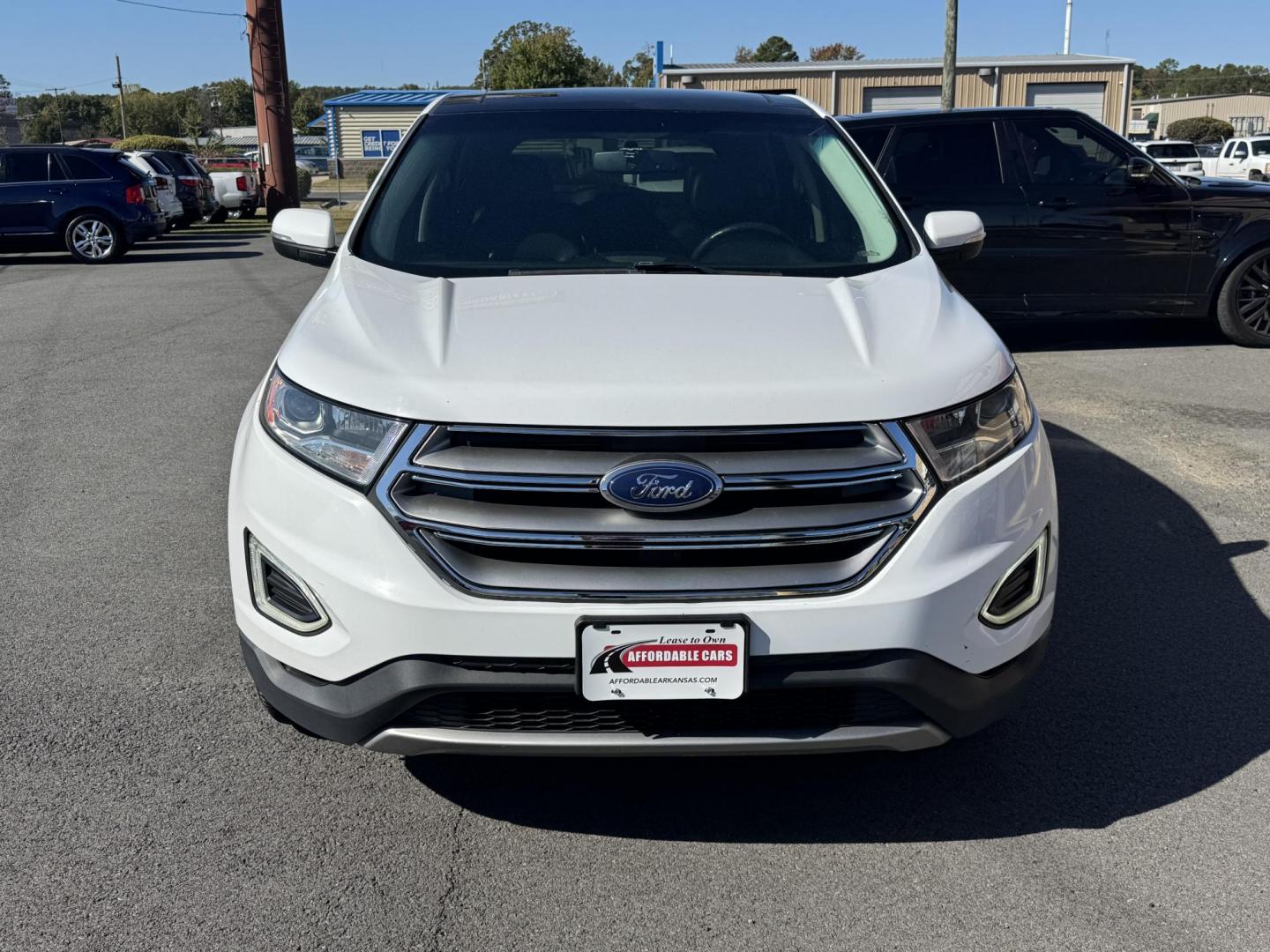 2016 White Ford Edge (2FMPK3J94GB) with an 4-Cyl EcoBoost 2.0L engine, Auto, 6-Spd SelShft transmission, located at 8008 Warden Rd, Sherwood, AR, 72120, (501) 801-6100, 34.830078, -92.186684 - Photo#2
