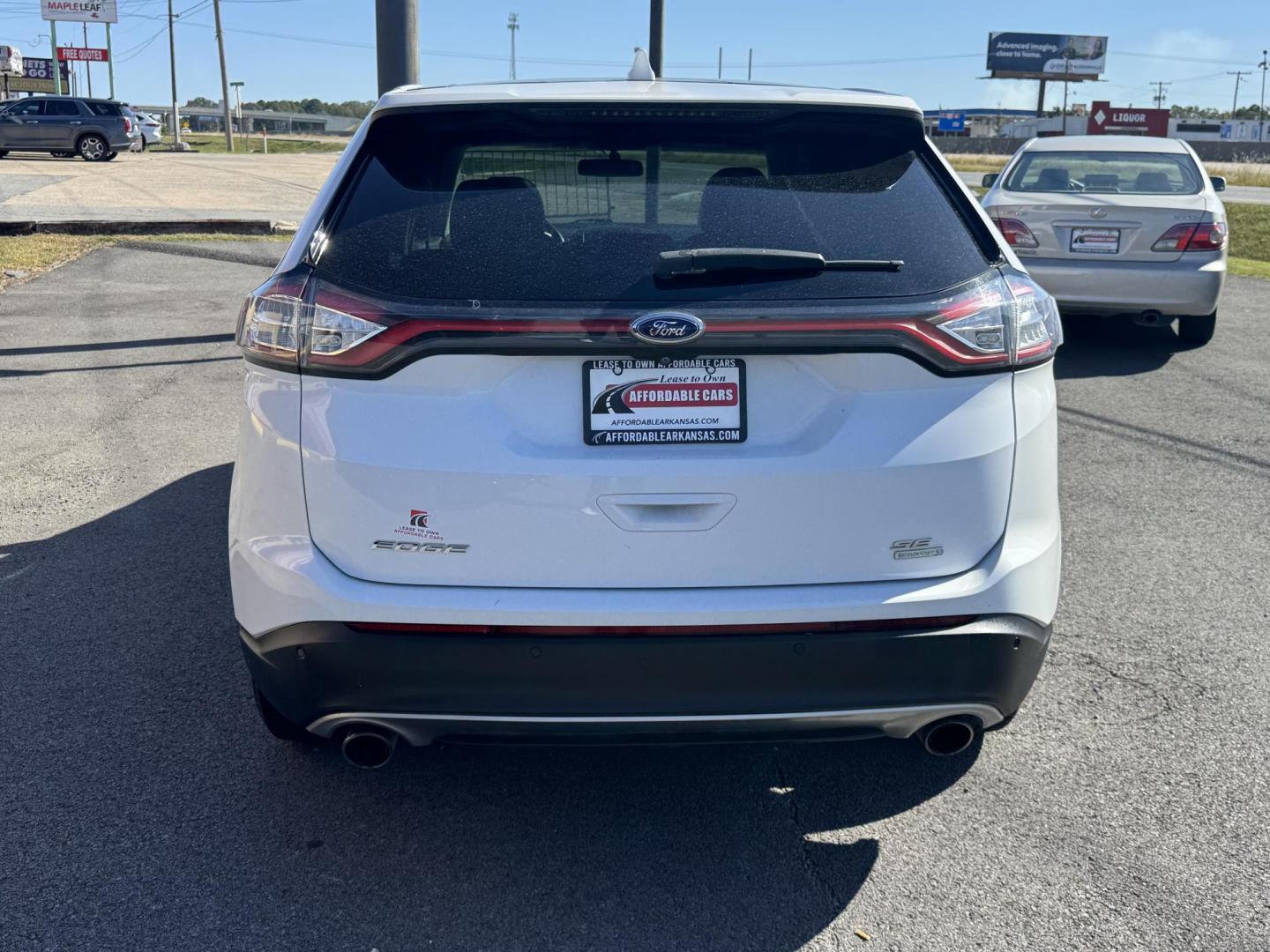 2016 White Ford Edge (2FMPK3J94GB) with an 4-Cyl EcoBoost 2.0L engine, Auto, 6-Spd SelShft transmission, located at 8008 Warden Rd, Sherwood, AR, 72120, (501) 801-6100, 34.830078, -92.186684 - Photo#6